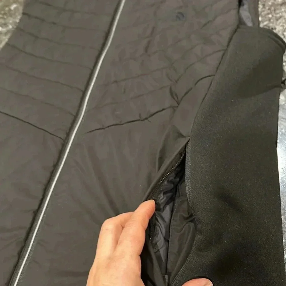 The North Face black puffer vest full front zip, pockets, front and back logo